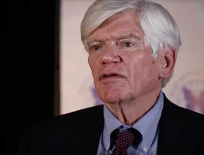 John Potts, Endocrinologist, actively discussing symptoms in a sit-down interview.