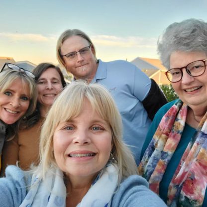 Four women and one man from the HypoPARAthyroidism Association Inc. are taking a selfie and smiling.